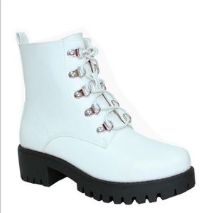 White lace up boots. Never been worn.